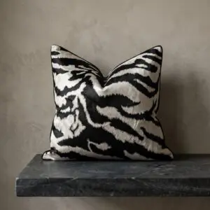 Zebra Luxe black and white zebra pillow cover on charcoal stone